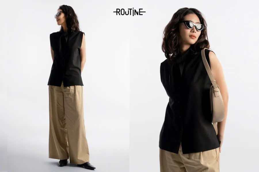 Chiếc áo kiểu nữ có phần hiện đại, phá cách hơn hẳn với tay cộc cùng phần thắt nơ cổ